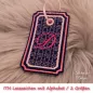 Preview: (Osterkalender-Türchen 6A) Stickdatei Set ITH Lesezeichen mit Alphabet in 2 Größen, Foto zeigt am Bändchen garngeöstes Lesezeichen, rechteckig, mit eingekerbten Ecken. Schwarz, Bestickung rosa-apricot, filigranes Muster, in rot schnörkeliger Buchstabe "D" Preview: (Osterkalender-Türchen 6A) Stickdatei Set ITH Lesezeichen mit Alphabet in 2 Größen, Foto zeigt am Bändchen garngeöstes Lesezeichen, rechteckig, mit eingekerbten Ecken. Schwarz, Bestickung rosa-apricot, filigranes Muster, in rot schnörkeliger Buchstabe "D"