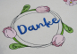 Preview: Stickdatei Danke mit einem dekorativen Tulpen-Kranz.