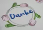 Preview: Stickdatei Danke mit einem dekorativen Tulpen-Kranz.