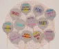 Preview: Stickdatei Set Ballon-Stabdeko ITH, Foto zeigt 12 Luftballon-Designstäbe aus mittelgrauem Filz, teilweise zusätzlich mit umrandeter Einstecköffnung. Bunte Bestickungen mit Ornamenten (Sterne, Schnörkel) und Schriftzügen ("Danke", "Nichts", "Peng"