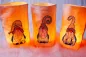 Preview: Stickdatei Set Gnomtrio - drei Gnome in Vollstick mit ITH-Lichtbeutel-Dateien (13x18), Foto mit drei hell erleuchteten Lichtbeuteln, jeder mit einem unterschiedlichen Gnom.