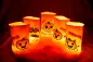 Preview: Stickdatei Set ITH Lichtbeutel Halloween (13x18 Rahmen) plus Einzelmotive, Foto mit 5 hell erleuchteten Ausfertigungen auf Felluntergrund. Beutel aus hellem Stoff mit Motiven (Fledermäuse; Kürbisse) und Schriftzügen. Preview: Stickdatei Set ITH Lichtbeutel Halloween (13x18 Rahmen) plus Einzelmotive, Foto mit 5 hell erleuchteten Ausfertigungen auf Felluntergrund. Beutel aus hellem Stoff mit Motiven (Fledermäuse; Kürbisse) und Schriftzügen.