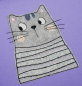 Preview: Stickdatei Spar-Set Cat Doodle Applikationen inkl. ITH Anhänger, Foto von Applikation Katzenbüste auf violettem Stoff. Größtenteils grau, mit Jäckchen aus grau-gepunktetem Stoff und Glizterstreifen.