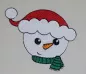 Mobile Preview: Stickdatei Set Christmas Faces Vollstick, Foto zeigt hellen Stoff, auf den ein Schneemannkopf mit Mütze und Schal gestickt ist (rot-grün-weiß-orange).