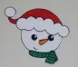 Preview: Stickdatei Set Christmas Faces Vollstick, Foto zeigt hellen Stoff, auf den ein Schneemannkopf mit Mütze und Schal gestickt ist (rot-grün-weiß-orange).