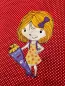 Preview: Stickdatei Set Schulkind Sophie (div. Rahmengrößen), Foto eines bunten Motivs auf rot-weiß gepunktetem Stoff. Blondes Mädchen im Kleid (gelb, orange Punkte) mit lila Haarschleife mit lila-gelber und verzierter Schultüte in einer Hand.