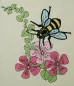 Preview: Stickdatei Biene 2 (div. Größen) Vollstick + florale Motive, Foto mit bunt besticktem hellem Stoff. Das Motiv ist eine Biene auf Blüten mit Blättern.