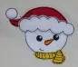 Preview: Stickdatei Set Christmas Faces Doodle-Applikationen, Foto zeigt auf hellen Stoff aufgebrachte Applikation. Schneemannkopf mit Mütze und Schal.