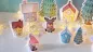 Preview: Stickdatei Set ITH LED Cover Winterdorf mit Gnomen, Häusern und Rentier.