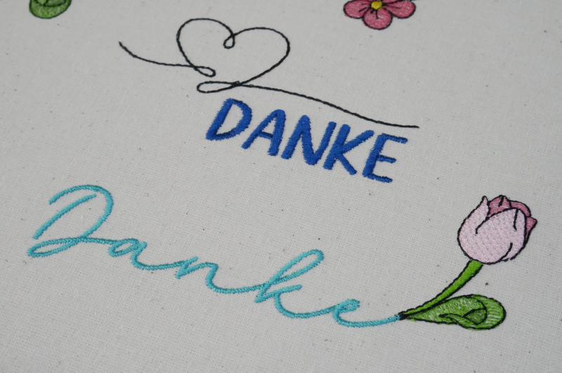 Stickdatei Danke mit einer Tulpe.