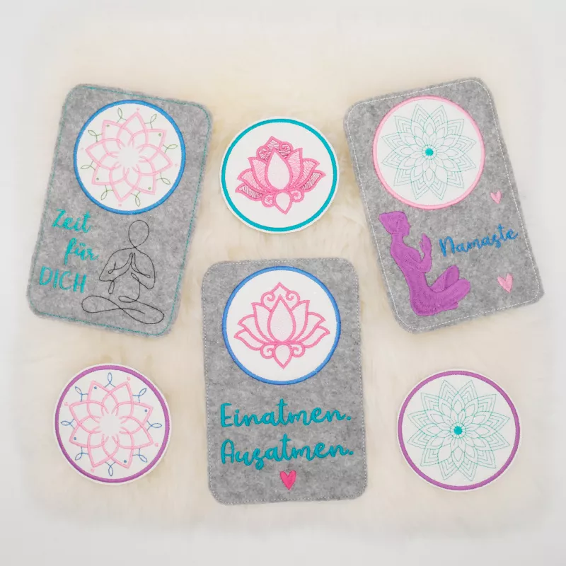 Stickdateien Yoga Mugrugs auf Filz gestickt.