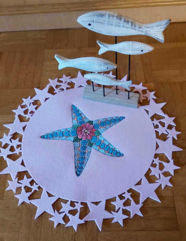 Preview: Stickdatei Seestern auf ein Tischset aus Filz gestickt.