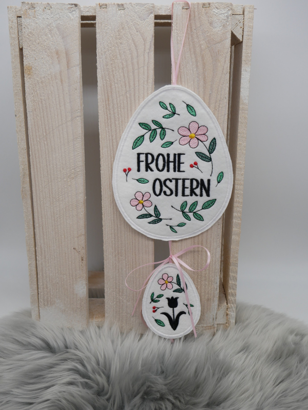 Stickdatei ITH Anhänger mit dem Schriftzug Frohe Ostern und einer Tulpe.