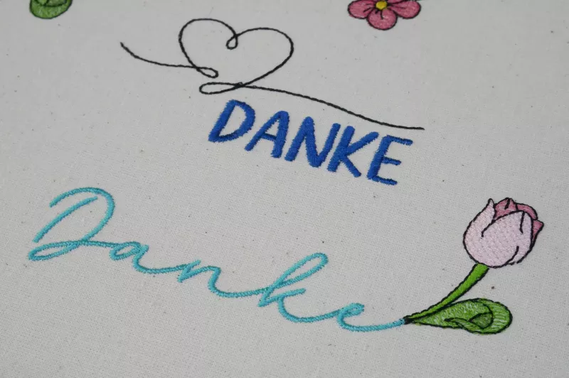 Stickdatei Danke mit einer Tulpe.