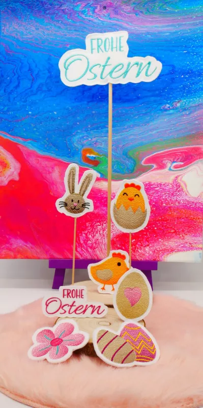 ITH Stickdateien mit einem Hasen, Küken, Schriftzug Frohe Ostern, Blumen und Eiern. ITH Stickdateien mit einem Hasen, Küken, Schriftzug Frohe Ostern, Blumen und Eiern.