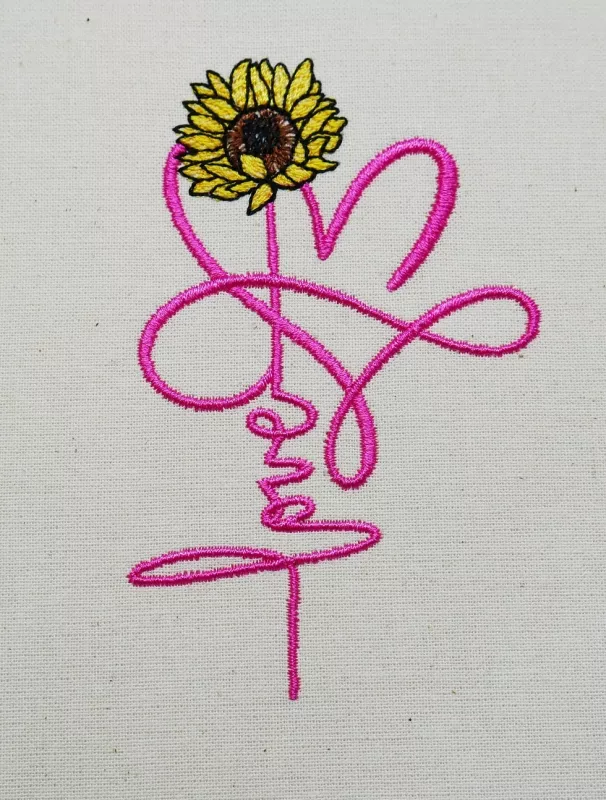 Schriftzug Love mit Herz und einer Sonnenblume.