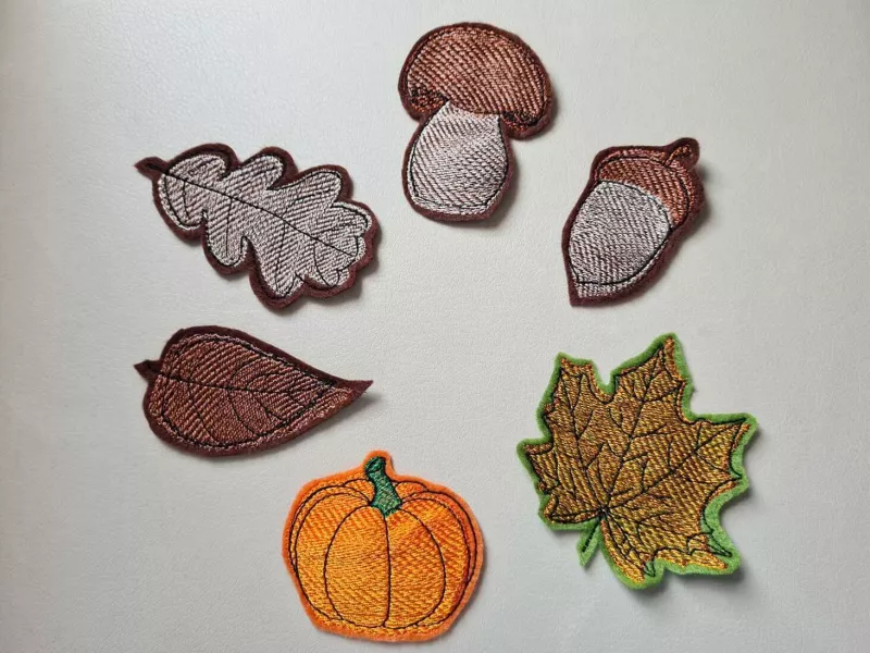 Herbstmotive auf Filz ausgestickt und ausgeschnitten