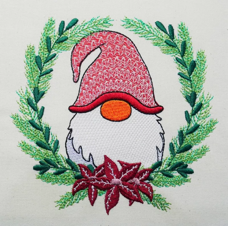 Christmas Gnome in der Größe 10x10 cm ausgestickt.