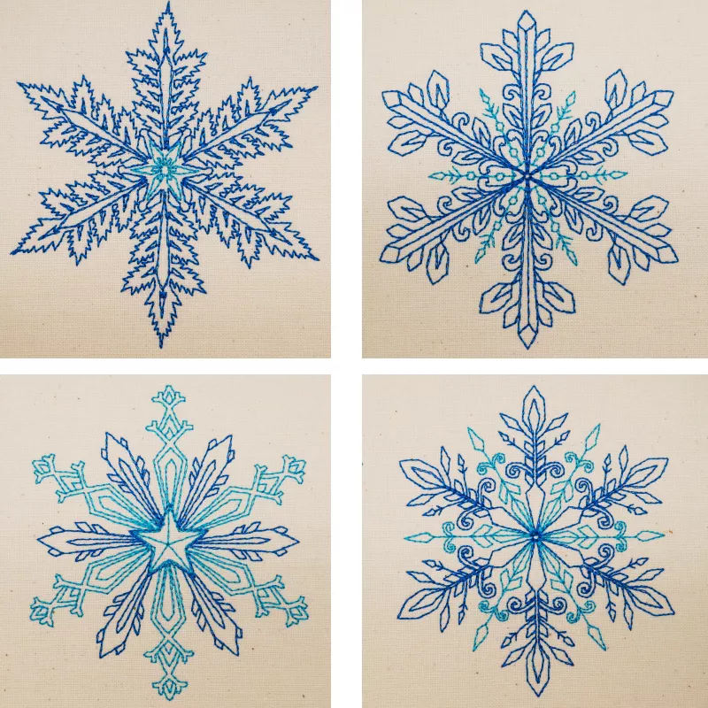 Vier Schneeflocken zweifarbig in Linienoptik 9-12