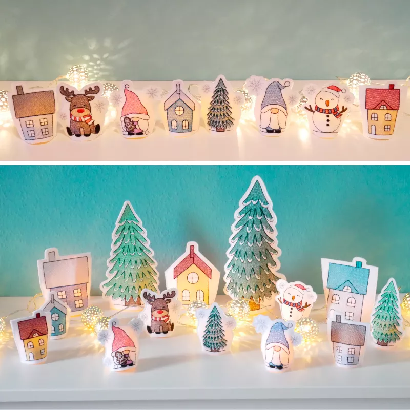 Stickdatei Set ITH LED Cover Winterdorf mit Gnomen, Rentier, Häusern, Tannen und Schneemann.